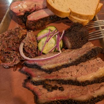 Micklethwait Craft Meats signature dishes Tex-Czech Sausage, BRISKET, Frito Pie.